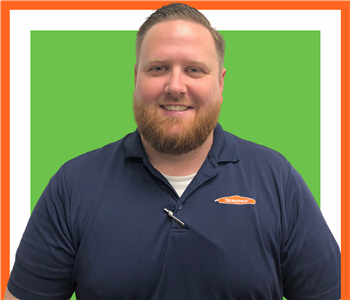 SERVPRO of Montgomery Country Sales and Marketing Representative, male employee in front of white wall