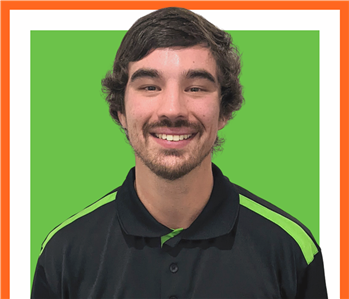 Dylan, servpro employee against a white background, man
