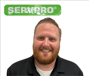 SERVPRO of Montgomery Country Sales and Marketing Representative, male employee in front of white wall
